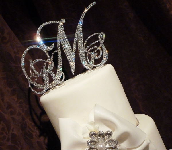 monogram cake topper 11 romantic and whimsical wedding decorations you can get for really cheap online