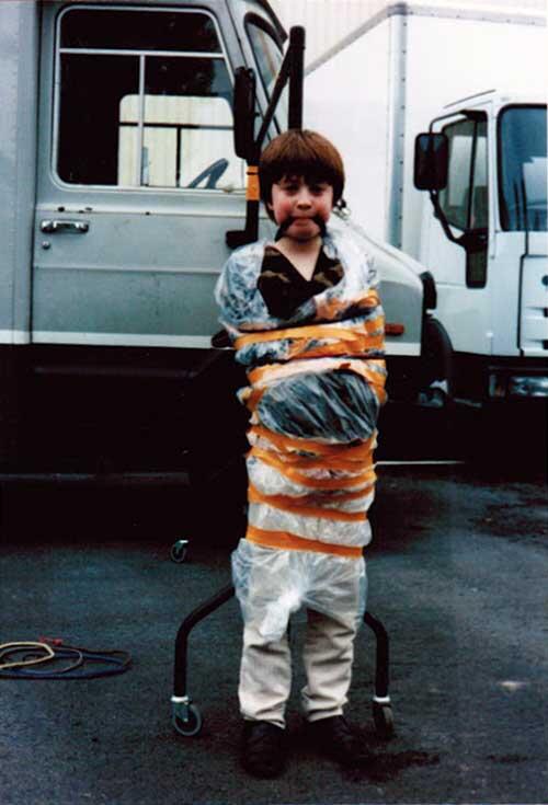 most amazing movie and TV behind-the-scenes of all time Daniel Radcliffe tied up on the set of David Copperfield after spraying various crew members with a water pistol