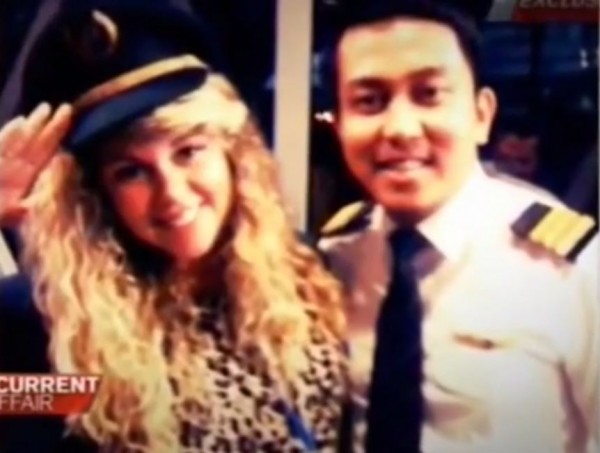 Missing Malaysia Airlines pilot Fariq Abdul Hamid with one of the women who claimed they were invited into the cockpit by Hamid during a flight in 2011. (Picture Source: A Current Affair / YouTube)