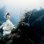 Surreal pictures of underwater nymphs on a shipwreck